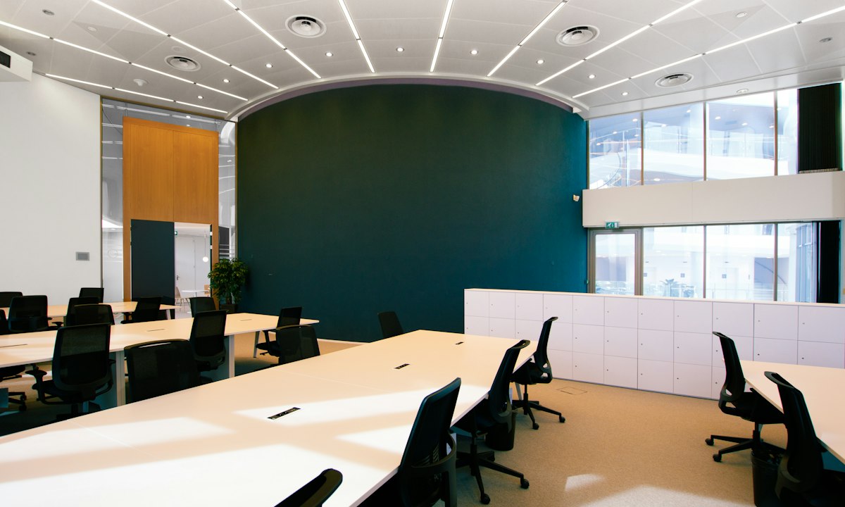 A meeting room before the meeting starts. Whoever discusses the proposal in advance with the most critical person walks in better prepared.